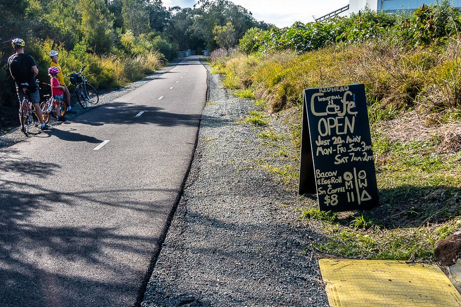 Sign for cafe on the side of the cycleway Sign for cafe on the side of the cycleway