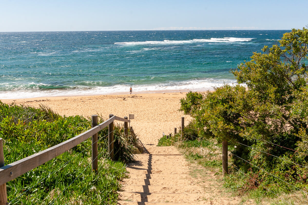 The beach is unpatrolled and dog-friendly, which makes it perfect for tranquil walks on the sand with your furry friend.
