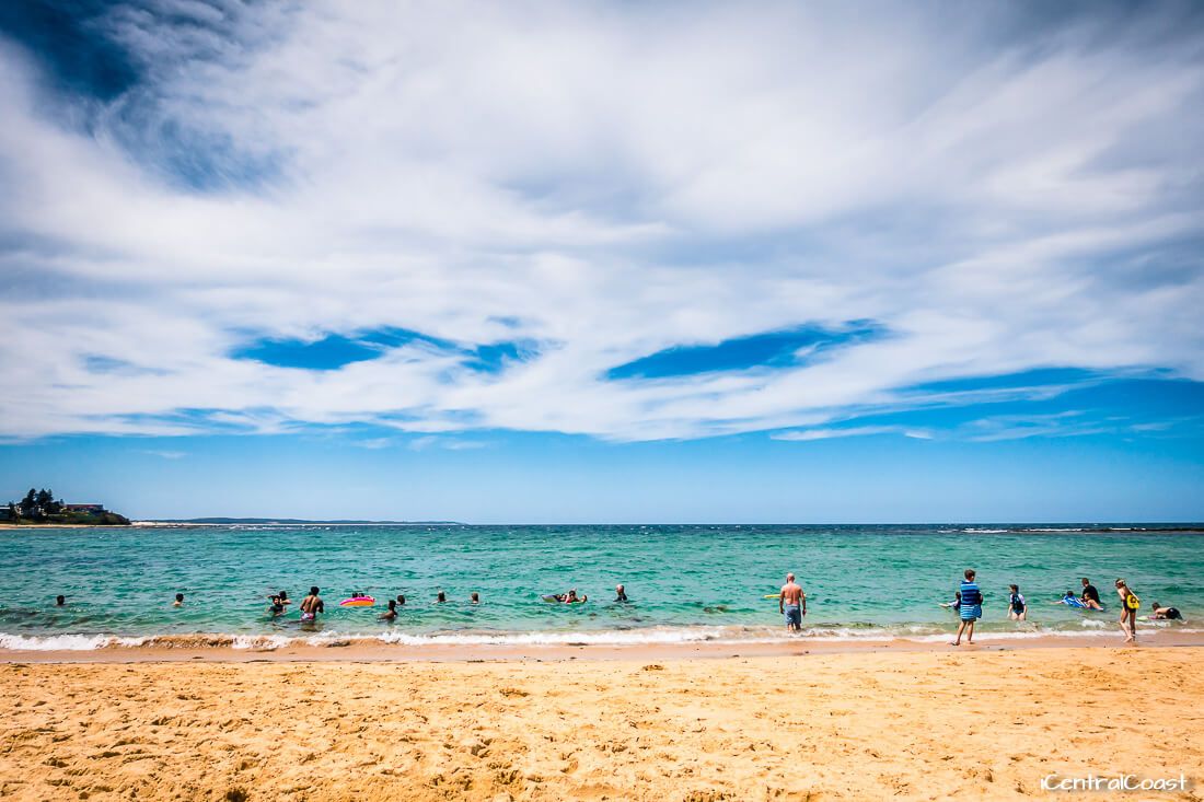Families swim between the flags Families swim between the flags