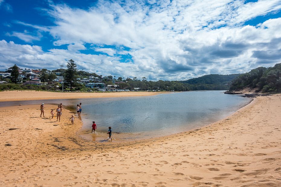 Families playing in the lagoon. Wamberal Lagoon